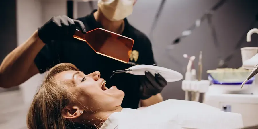 Dentist talking with a patient before an extraction
